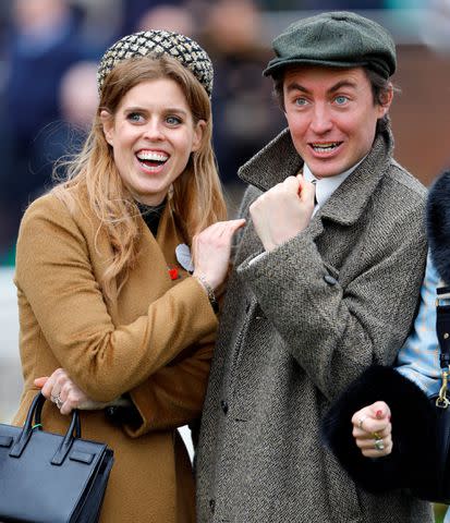 <p>Max Mumby/Indigo/Getty</p> Princess Beatrice and Edoardo Mapelli Mozzi have a laugh at the Cheltenham Festival at Cheltenham Racecourse on March 14, 2024.