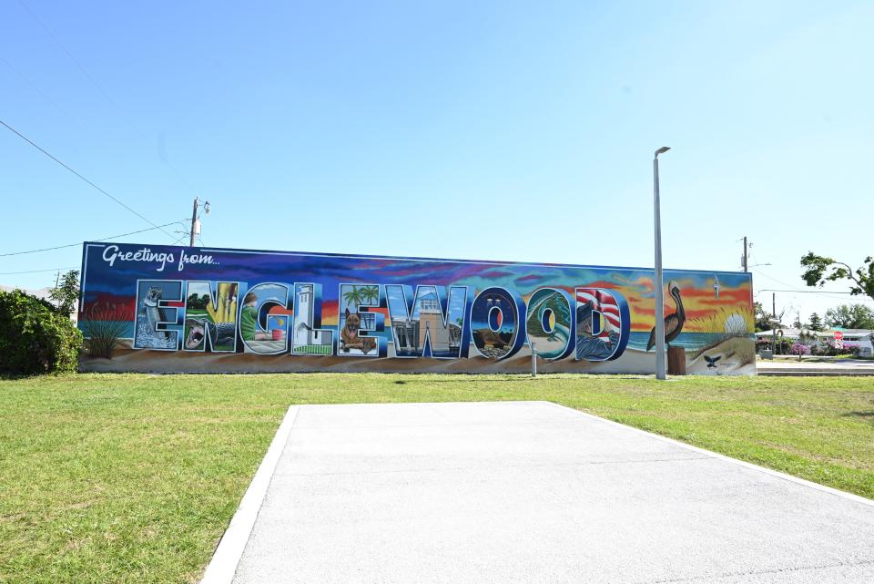 This mural by artist Matt McAllister, greets visitors to Pioneer Park in Englewood.