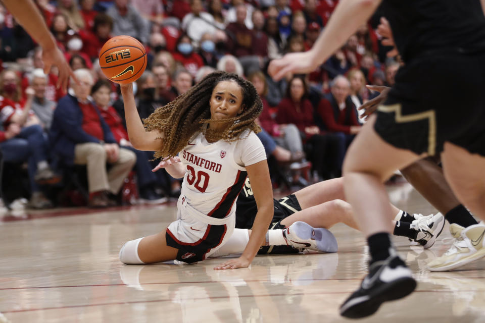 Stanford guard Haley Jones (30) passes the ball against Colorado during the first quarter of an NCAA college basketball game in Stanford, Calif., Sunday, Jan. 22, 2023. (AP Photo/Jim Gensheimer)
