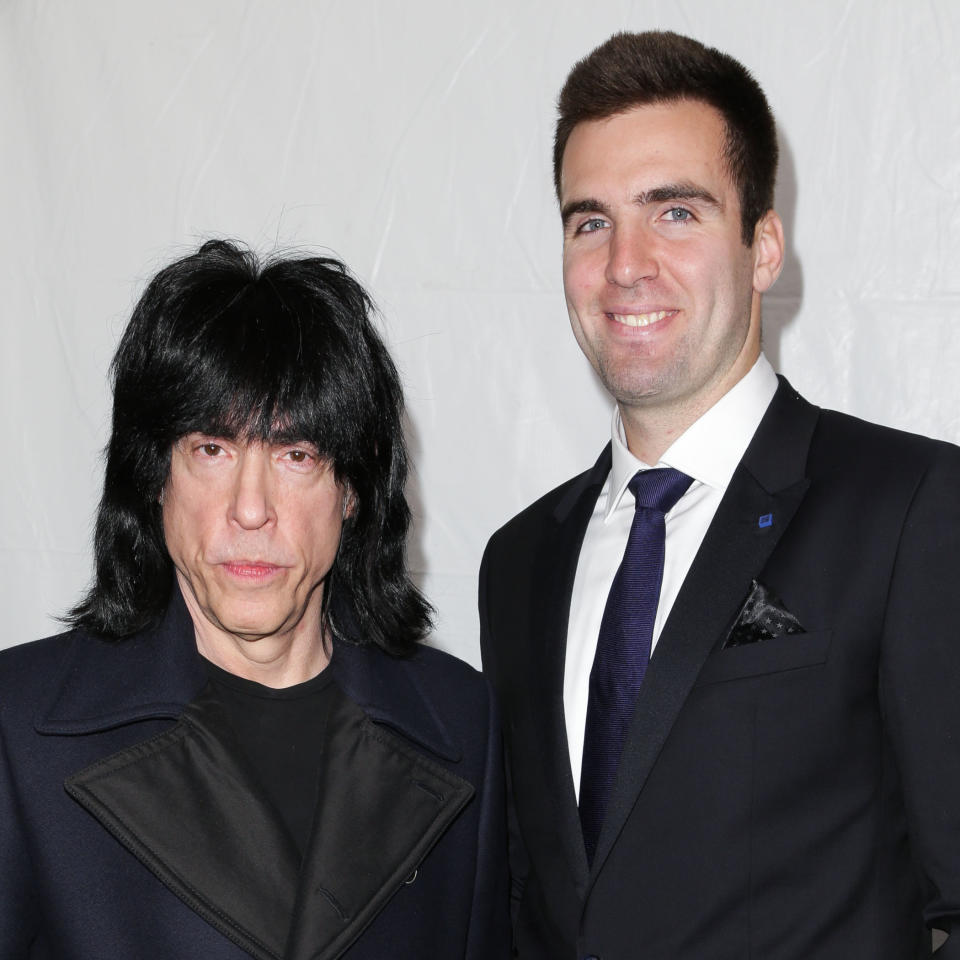 This image released by Starpix shows Ramones drummer Marky Ramone, left, and Baltimore Ravens quarterback Joe Flacco at the Tommy Hilfiger Men's Fall 2013 collection, Friday, Feb. 8, 2013 during Fashion Week in New York. (AP Photo/Starpix, Andrew Toth)