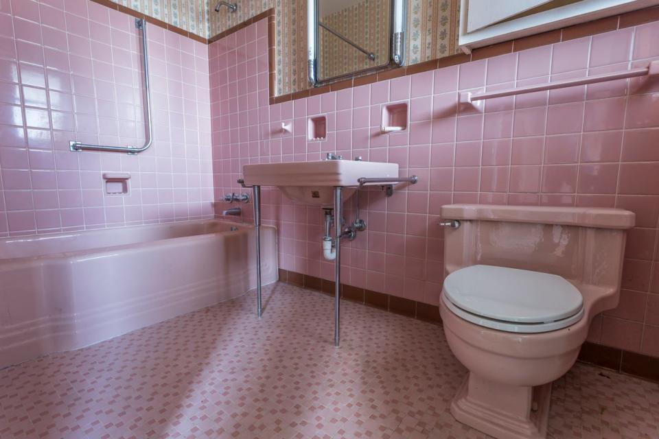 Fancy pink bathroom in a classic home