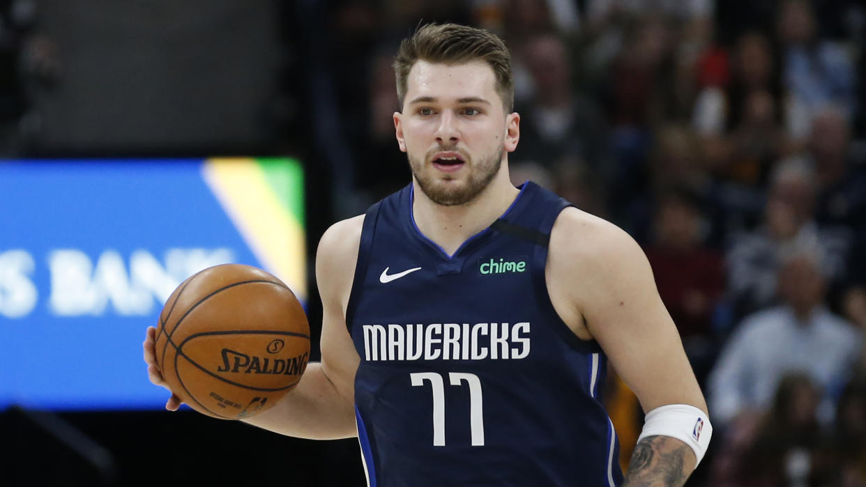 Luka Doncic rolled the same ankle that forced him to miss time in December. (AP Photo/Rick Bowmer)