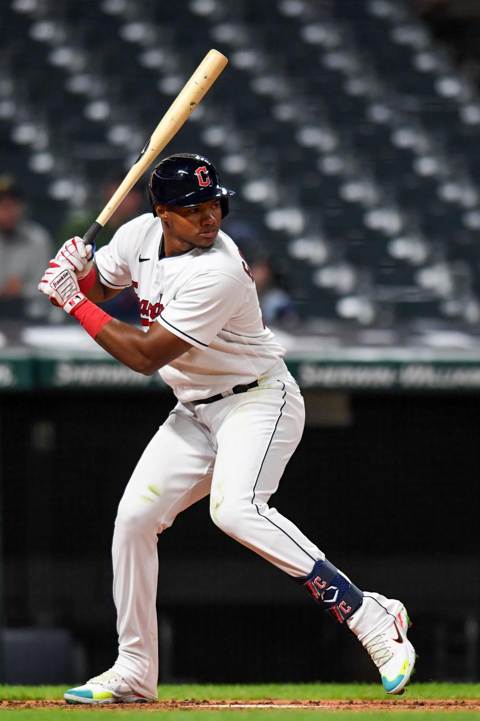 Cleveland Guardians' Oscar Gonzalez bats against the Texas Rangers during the fifth inning of a baseball game, Wednesday, June 8, 2022, in Cleveland. (AP Photo/Nick Cammett)