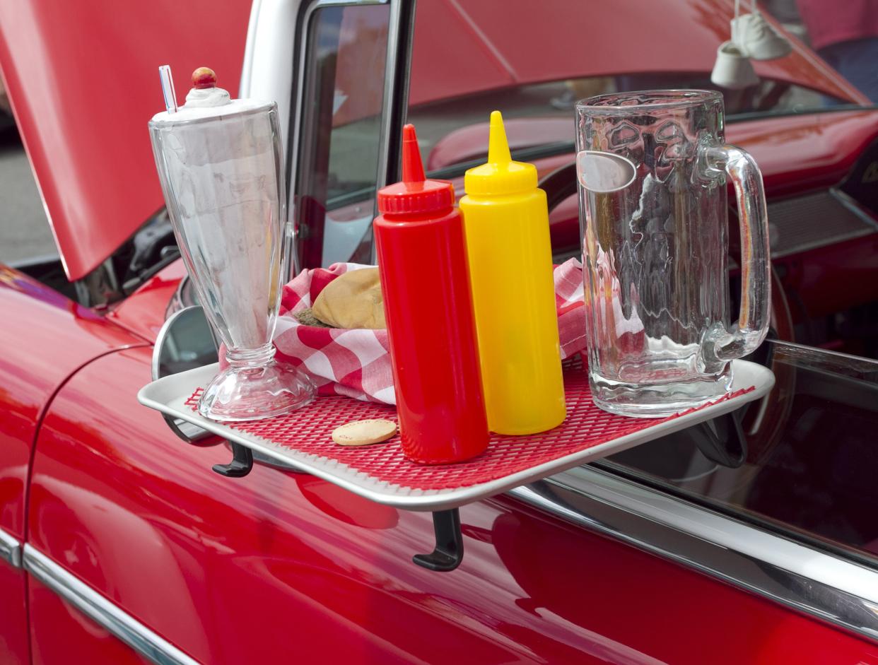 classic car with drive in restaurant condiment tray