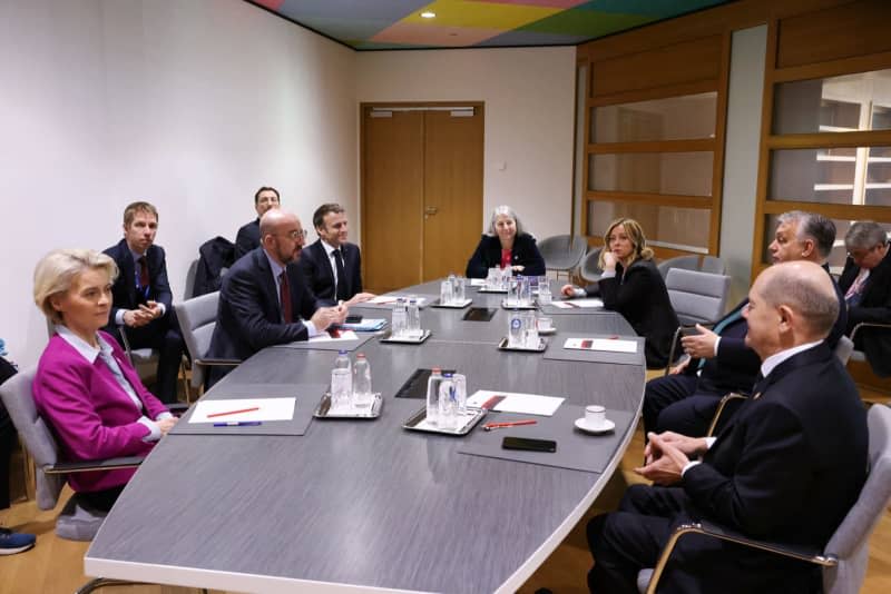 (L-R) President of the European Commission Ursula von der Leyen, President of the European Council Charles Michel, French President Emmanuel Macron, General Secretary of the Council of the European Union Therese Blanchet, Italian Prime Minister Giorgia Meloni, Hungarian Prime Minister Viktor Orban and German Chancellor Olaf Scholz attend a meeting ahead of the European Council meeting at the European headquarters in Brussels. -/European Council/dpa