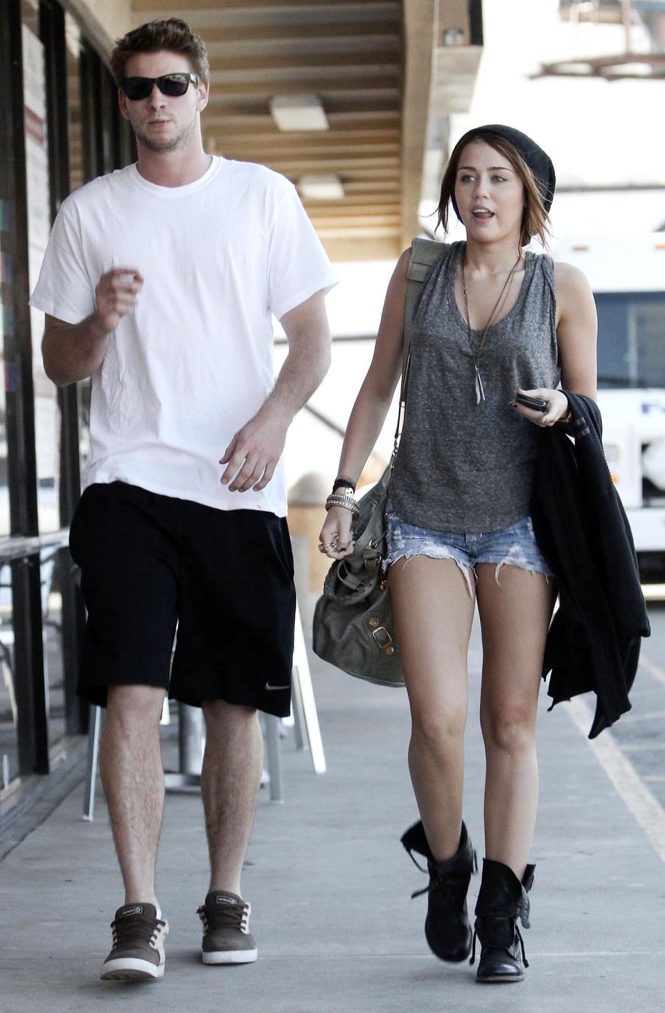 Los Angeles, Mar. 29, 2010 Miley Cyrus&nbsp;and boyfriend Liam Hemsworth were spotted leaving Sushi Dan in Studio City, CA.