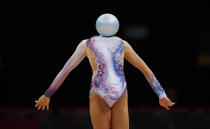 Bulgaria's Silviya Miteva competes using the ball in the individual all-around rhythmic gymnastics final at Wembley Arena during the London 2012 Olympic Games August 11, 2012. REUTERS/Marcelo Del Pozo (BRITAIN - Tags: SPORT GYMNASTICS OLYMPICS TPX IMAGES OF THE DAY)