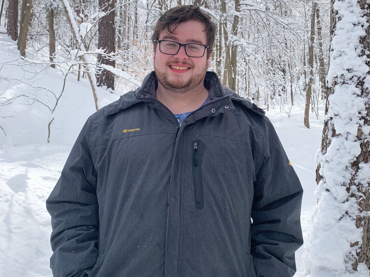 matthew wilson, smiling in the snow