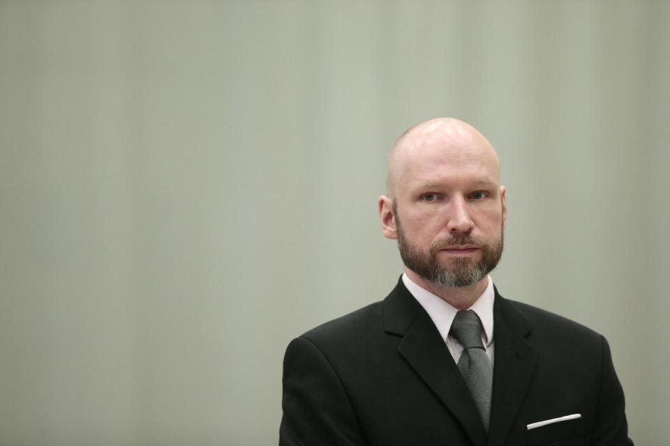 Anders Behring Breivik looks on during the last day of his appeal case in Borgarting Court of Appeal at Telemark prison in Skien, Norway, Wednesday, Jan. 18, 2017. Norway has defended the prison conditions under which mass murderer Anders Behring Breivik is being held. The state attorney presented its closing statement in an appeals trial against a lower court ruling that found that Breivik's isolation in prison violated his human rights. (Lise Aaserud/NTB Scanpix via AP)