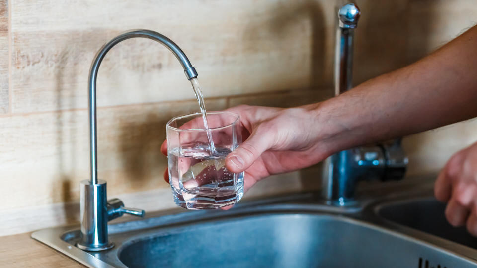 Filling up a glass of filtered water