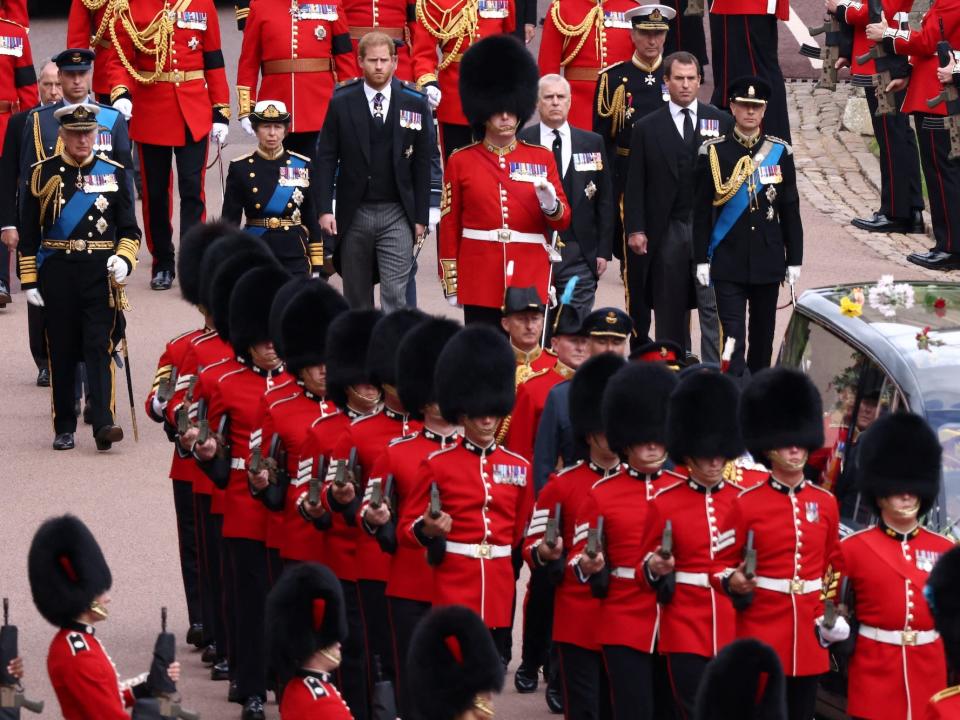 The royal family processes behind Queen Elizabeth's hearse at Windsor Castle.