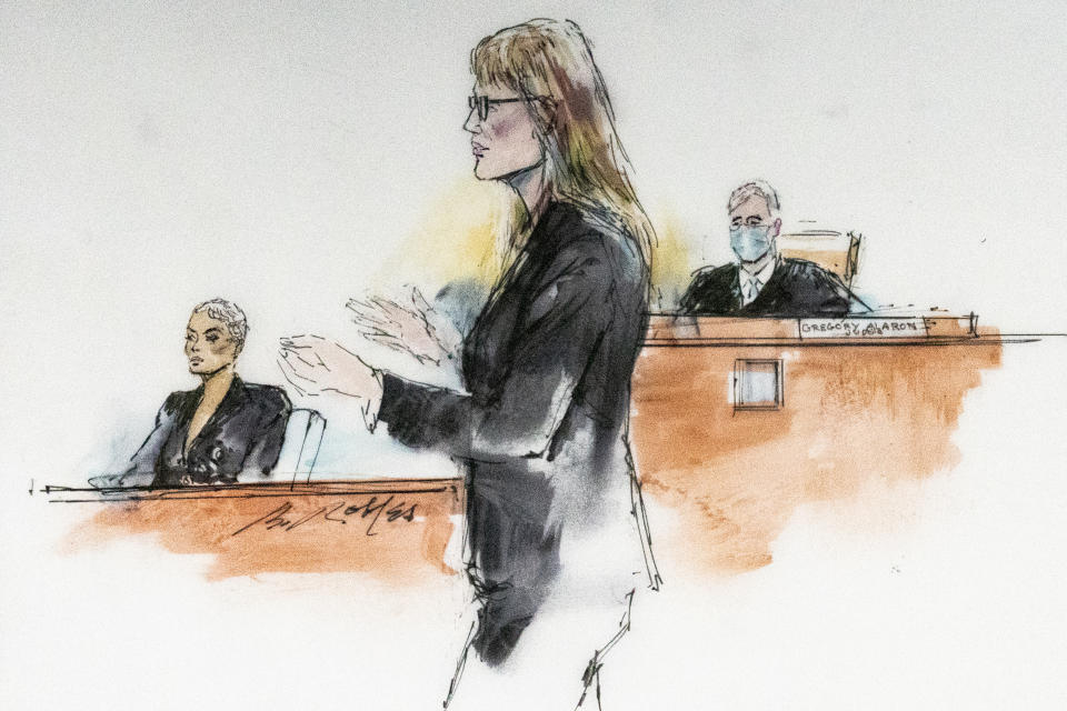 In this courtroom artist sketch, Los Angeles Superior Court Judge Gregory W. Alarcon, background right, listens to Blac Chyna's lawyer Lynne Ciani, middle, as Blac Chyna, left, appears in court in Los Angeles, Tuesday, April 19, 2022. A jury has been seated in the trial that pits model and former reality television star Blac Chyna against the Kardashian family, who she alleges destroyed her TV career. (Bill Robles via AP)