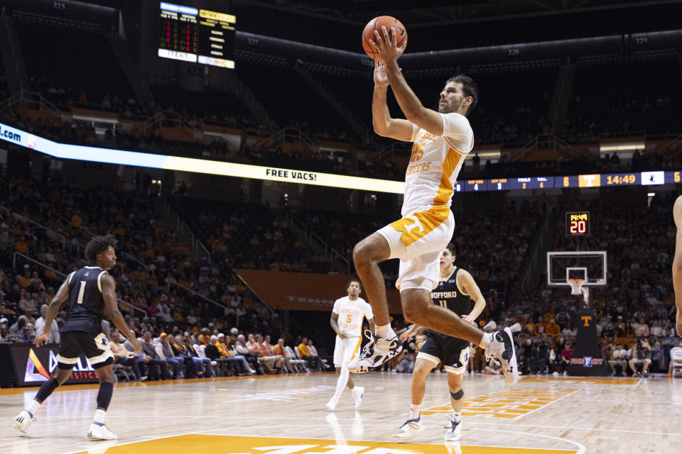 Tennessee guard Santiago Vescovi (25) shoots a layup during the first half of the team's NCAA college basketball game against Wofford on Tuesday, Nov. 14, 2023, in Knoxville, Tenn. (AP Photo/Wade Payne)