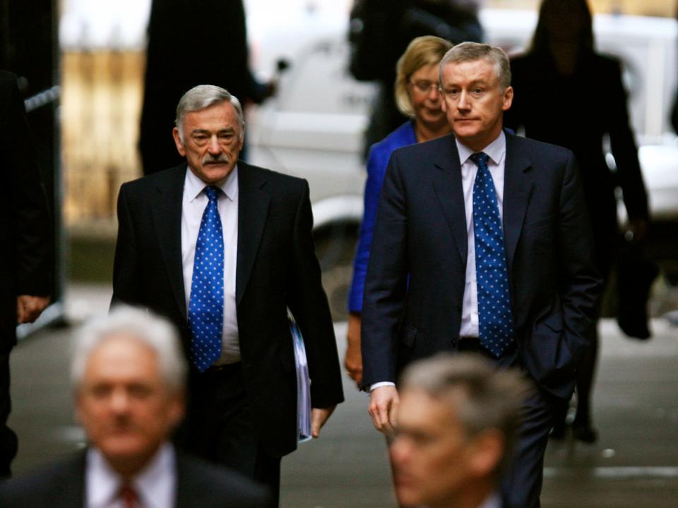 RBS former Chairman Tom McKillop (L) and ex-CEO Fred Goodwin arrive for the RBS shareholders meeting in Edinburgh, Scotland November 20, 2008.