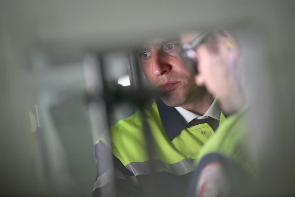 <p>French presidential election candidate for the En Marche ! movement Emmanuel Macron, right, visits the VOA glass-making company during a campaign trip in Albi, southwestern France, Thursday, May 4, 2017. French centrist Emmanuel Macron has already achieved an immense task: a former outsider with little political experience, he is now the front-runner in France’s presidential race, banking on the promise to reform the country through radical pro-business measures and pro-European policies. (Eric Feferberg/Pool Photo via AP) </p>