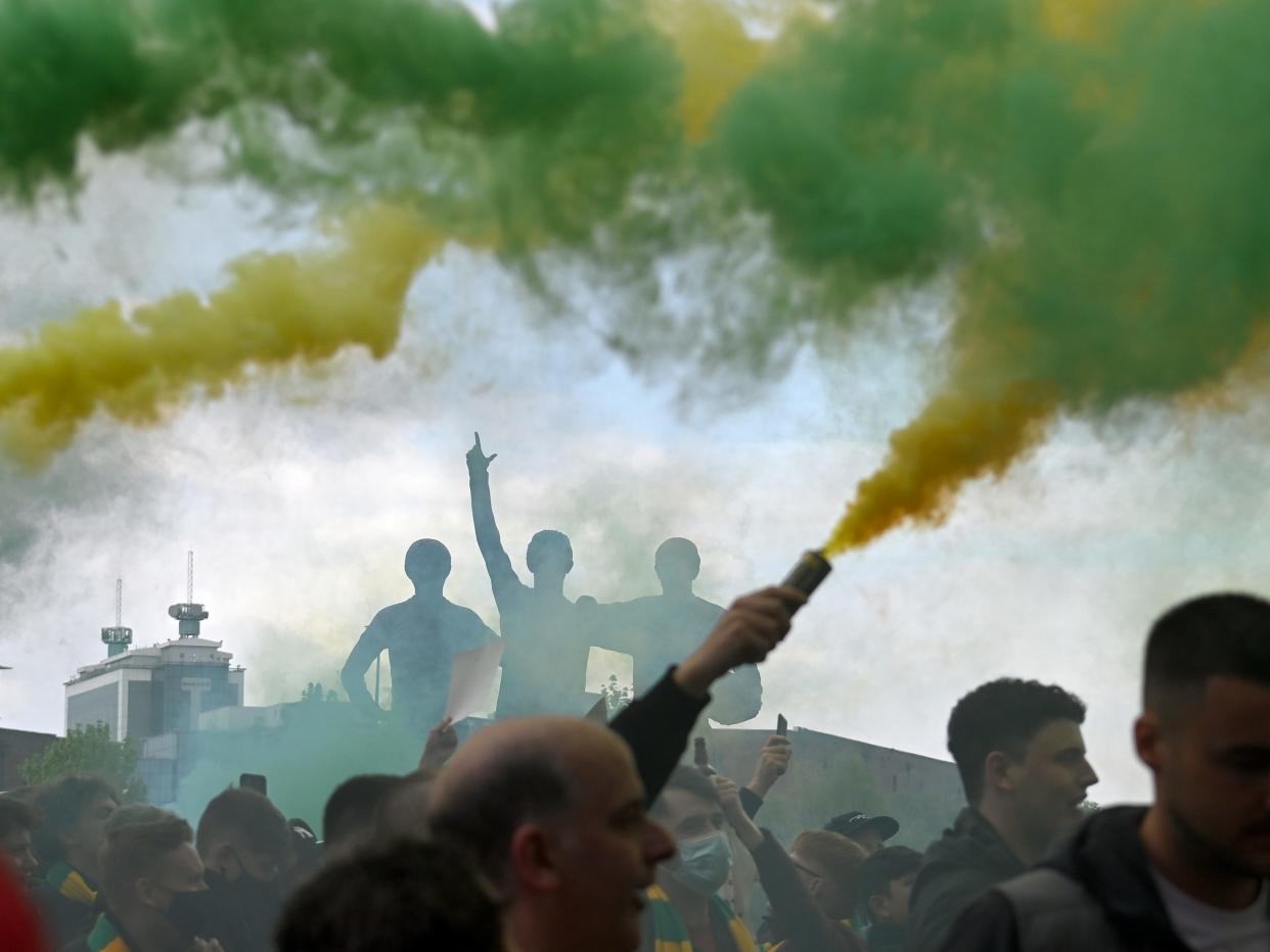 fans manchester united protest storm