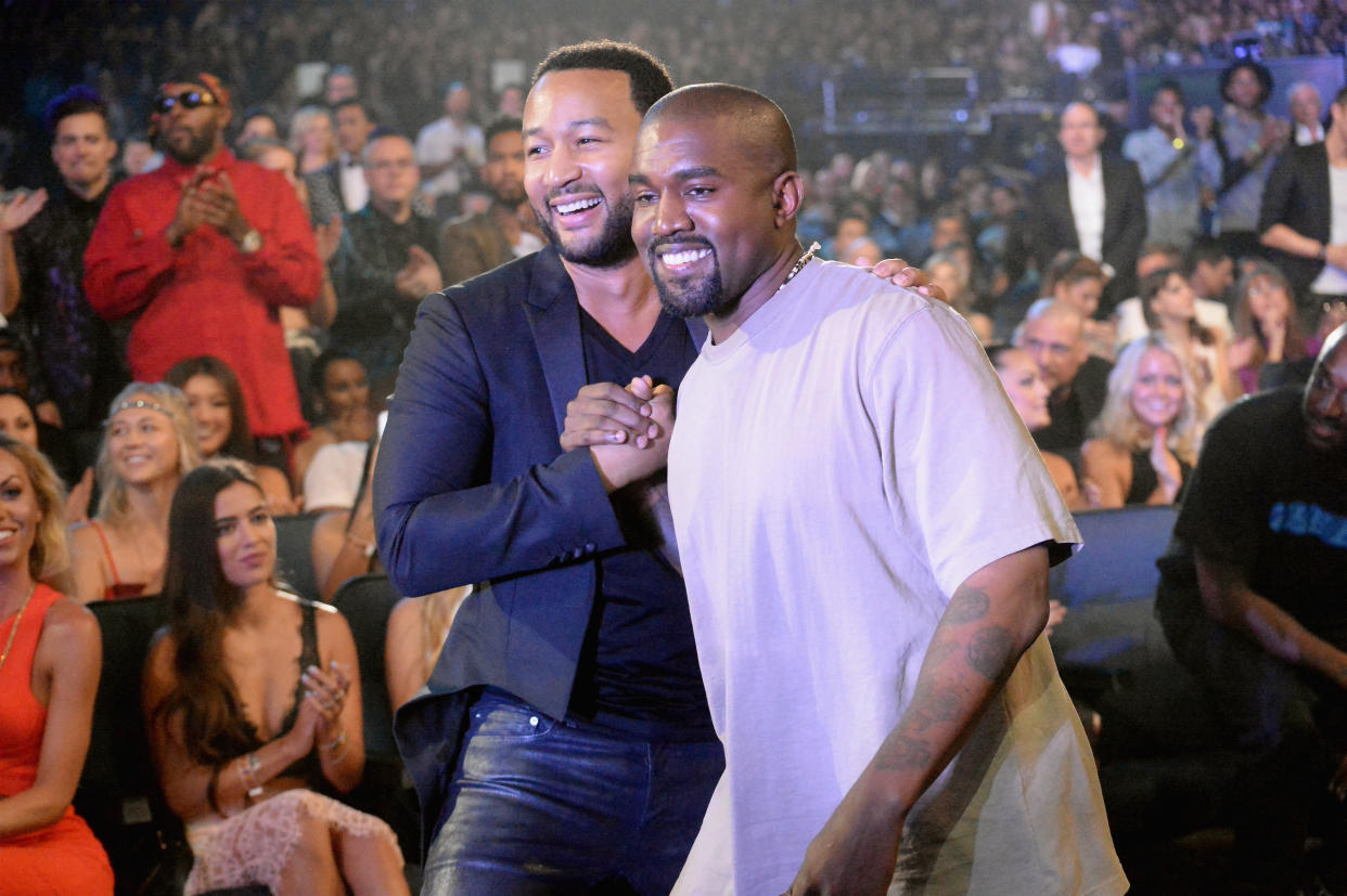 John Legend and Kanye West attend the 2015 MTV Video Music Awards. (Photo: Jeff Kravitz/MTV1415/FilmMagic)