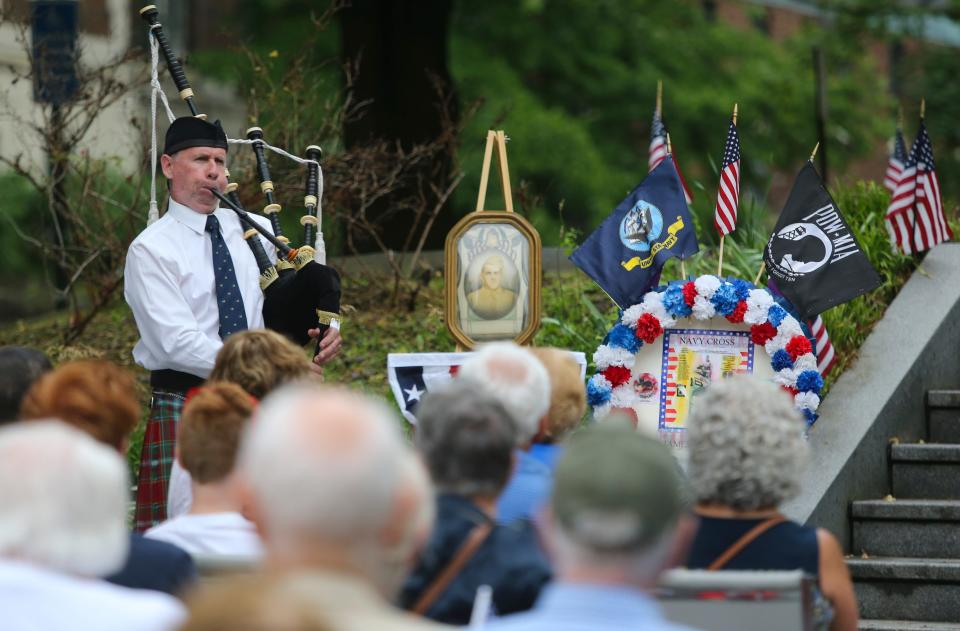 Bagpiper Rob Galloway plays Amazin Grace during the Wilmington Memorial Day ceremony Thursday at the Delaware Soldiers and Sailors monument in 2019.