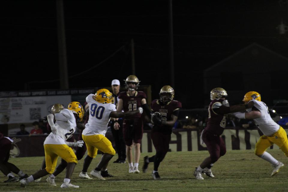 St. Augustine's Devonte Lyons (6) rushes for yardage against the Palatka defense during a high school football game on November 3, 2023. [Gabby Alfveby/For the St. Augustine Record]