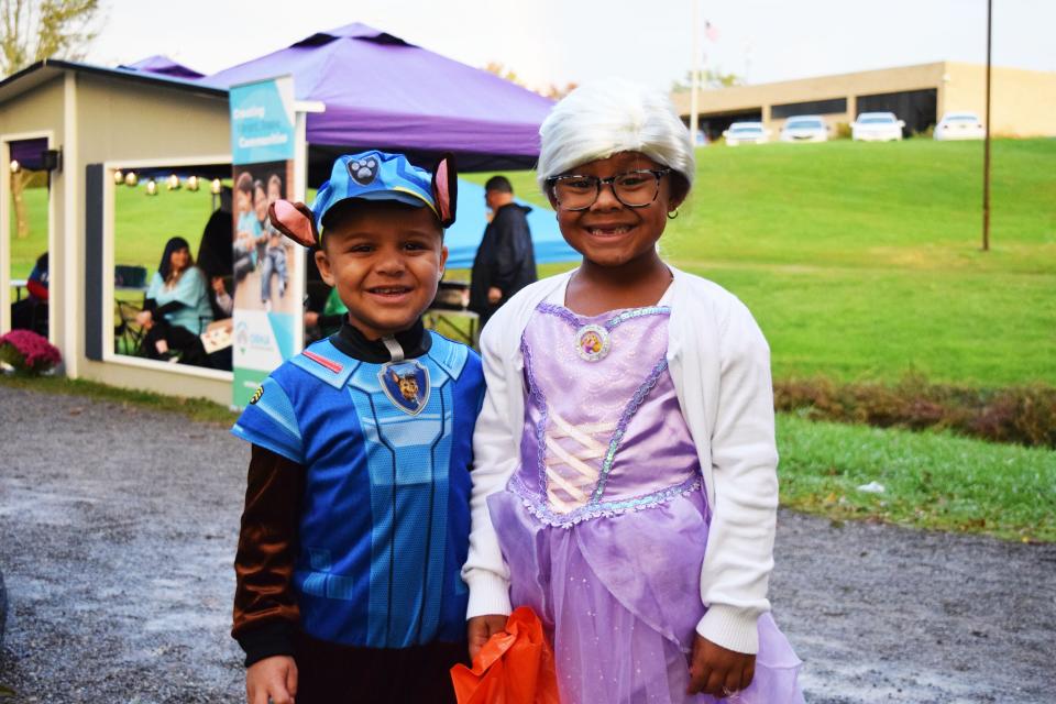 Chase and Elsa stop for a photo as they traverse the Monster Mash Bash.