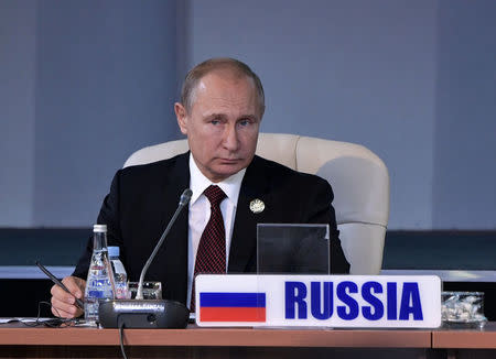 Russian President Vladimir Putin attends a session of the BRICS summit in Johannesburg, South Africa July 27, 2018. Sputnik/Alexei Nikolsky/Kremlin via REUTERS