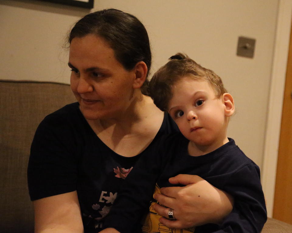 LONDON, UNITED KINGDOM - JUNE 09: Fatma Evrensel (L) and one of his sons, who were formerly siamese twins operated in the United Kingdom and successfully separated, pose for a photo in London, United Kingdom on June 09, 2020. With the helping hand from Turkish President Recep Tayyip Erdogan, the 2-year-olds Derman and Yigit were operated in the United Kingdom and successfully separated. Following post-surgical treatment, the family look forward to coming home from Luton Airport tonight. (Photo by Tayfun Salci/Anadolu Agency via Getty Images)