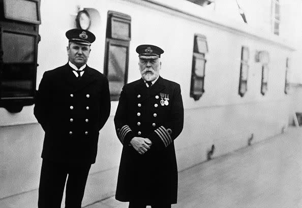 Purser Hugh Walter McElroy and Captain Edward J. Smith aboard the Titanic during the run from Southampton to Queenstown, England. The man who took the photograph, Rev. F.M. Browne, got off at Queenstown, three days before the ship hit an iceberg and sank. (Photo by Ralph White/CORBIS/Corbis via Getty Images)