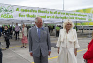 The Prince of Wales and the Duchess of Cornwall during their visit to the Asda Distribution Centre in Avonmouth, Bristol, where they thanked staff who have kept the country's vital food supplies moving throughout the coronavirus pandemic.