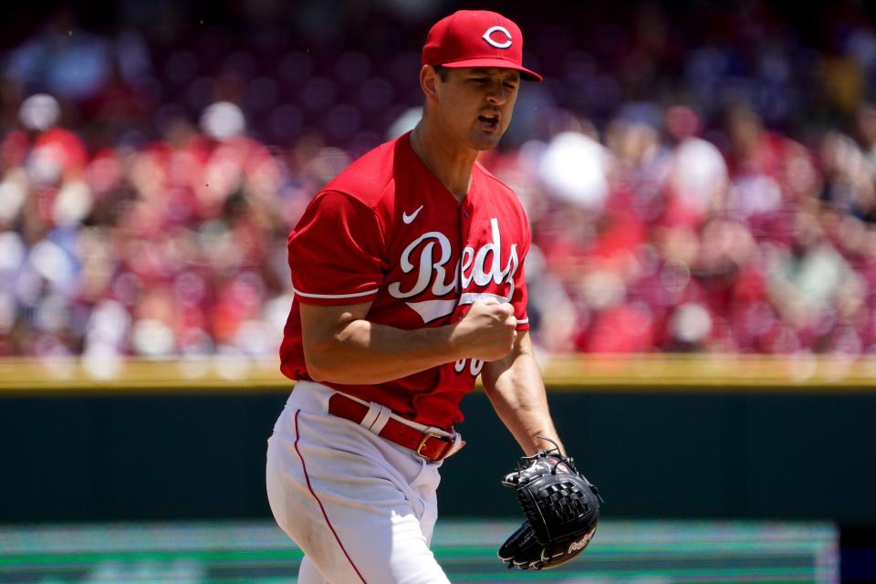 Cincinnati Reds starting pitcher Tyler Mahle (30) reacts after striking out a batter to end the top of the sixth inning during a baseball game against the San Francisco Giants, Sunday, May 29, 2022, at Great American Ball Park in Cincinnati. The San Francisco Giants won, 6-4.