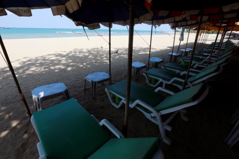 Empty chairs are seen on a beach amid fears of coronavirus disease (COVID-19) in Pattaya