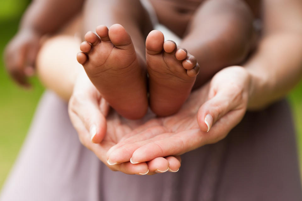 woman holding a baby