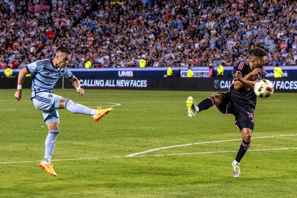 Sporting Kansas City midfielder Erik Thommy (26) kicks the ball to make a goal in the second half during an MLS game against Inter Miami at GEHA Field at Arrowhead Stadium on Saturday, April 13, 2024, in Kansas City.