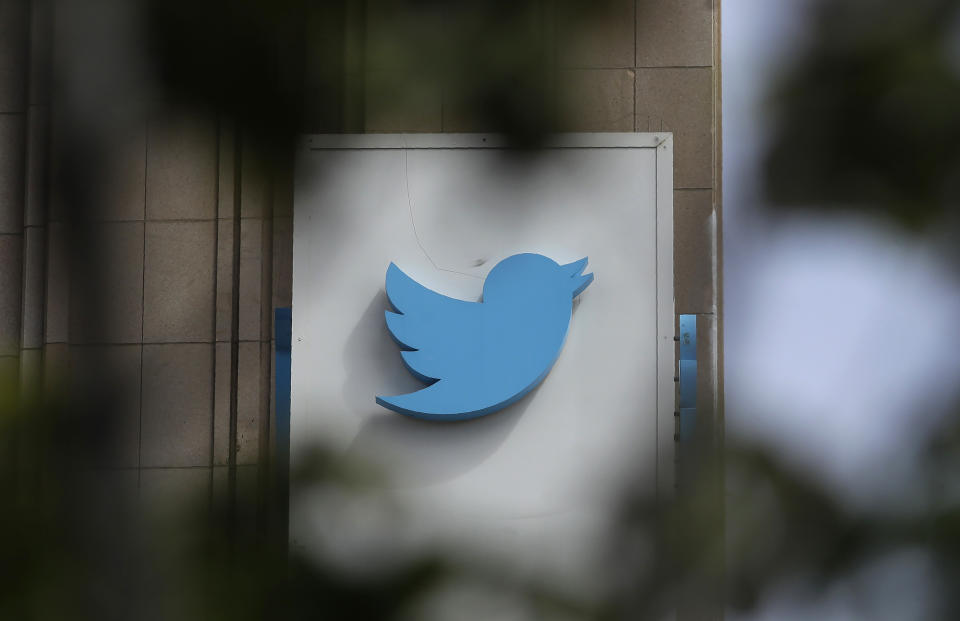 FILE - This July 9, 2019, file photo shows a sign outside of the Twitter office building in San Francisco. Social media companies have vowed to tackle misinformation in politics. Social media companies have vowed to tackle misinformation in politics. But when Britain's Conservative Party changed its press office Twitter account Tuesday, Nov. 19, to look like a fact-checking site during a televised debate, the only consequence was a promise from Twitter to take action if they did it again. (AP Photo/Jeff Chiu, File)