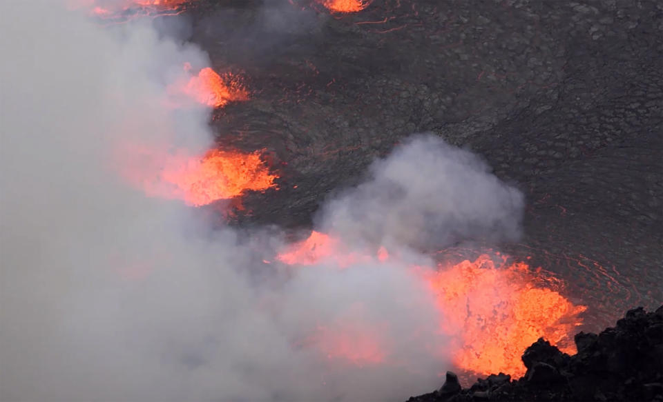 This photo provided by USGS shows the eruption within in Kilauea volcano's Halemaumau crater west vent on Wednesday, Sept. 29, 2021. One of the most active volcanos on Earth is erupting on Hawaii's Big Island. (USGS via AP)