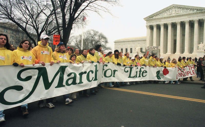 FILE PHOTO: Abortion foes march past the Supreme Court, which ruled in Roe v Wade on January 22, 1973