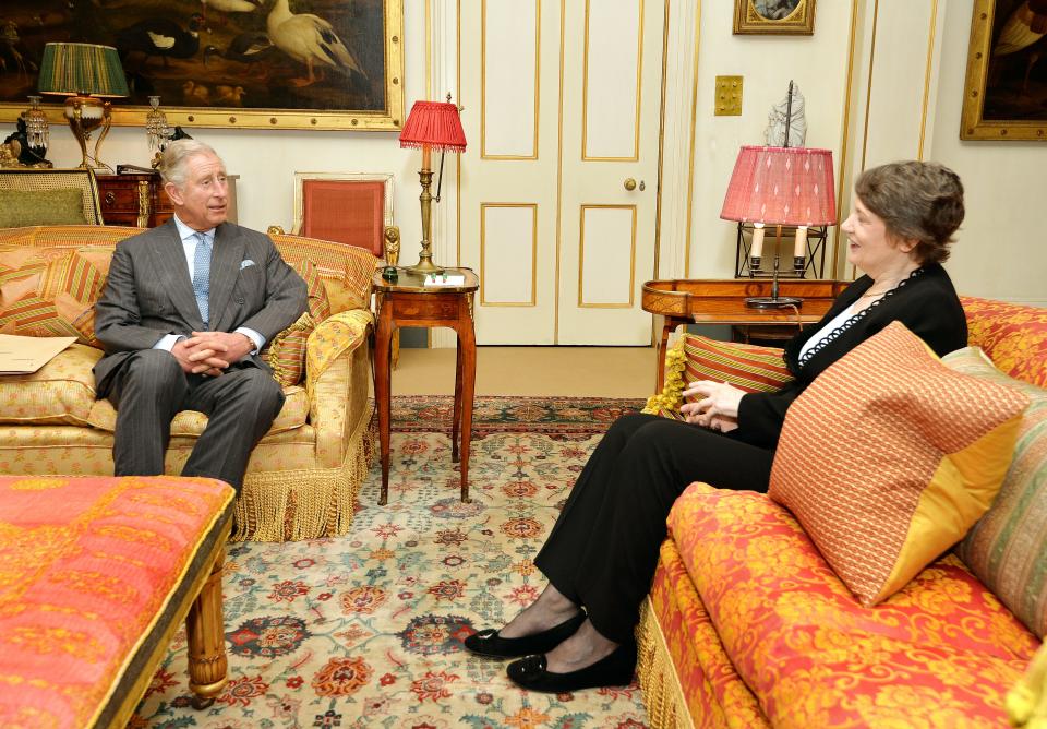 Prince Charles meets with Helen Clark, the former Prime Minister of New Zealand, in the Garden Room at Clarence House in 2013.