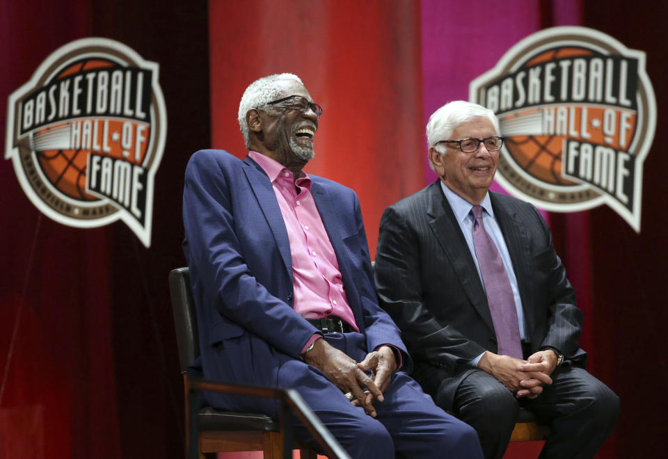 Bill Russell, left, laughs alongside David Stern as they listen to inductee Rick Welts during induction ceremonies into the Basketball Hall of Fame, Friday, Sept. 7, 2018, in Springfield, Mass. (AP Photo/Elise Amendola)