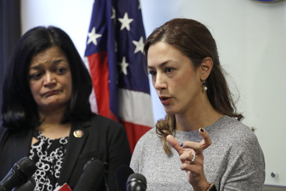 Rep. Pramila Jayapal, D-Wash., left, looks on as Negah Hekmati speaks about her hours-long delay returning to the U.S. from Canada with her family days earlier, at a news conference Monday, Jan. 6, 2020, in Seattle. Civil rights groups and lawmakers were demanding information from federal officials following reports that dozens of Iranian-Americans were held up and questioned at the border as they returned to the United States from Canada over the weekend. In a statement Sunday, the Washington state chapter of the Council on American-Islamic Relations said more than 60 Iranians and Iranian-Americans were detained and questioned at the Peace Arch Border Crossing in Blaine, Washington. (AP Photo/Elaine Thompson)