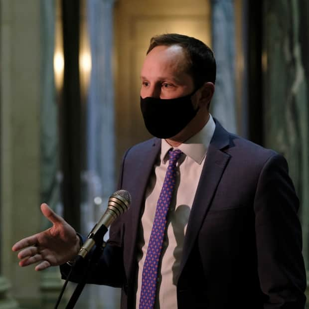 Saskatchewan NDP Leader Ryan Meili speaks to media after the throne speech at the Legislative Building in Regina on Monday Nov. 30, 2020. 