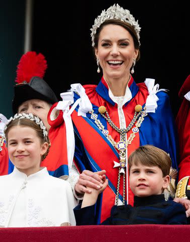 <p>Pool/Samir Hussein/WireImage</p> From left: Princess Charlotte, Kate Middleton and Prince Louis after the coronation on May 6, 2023