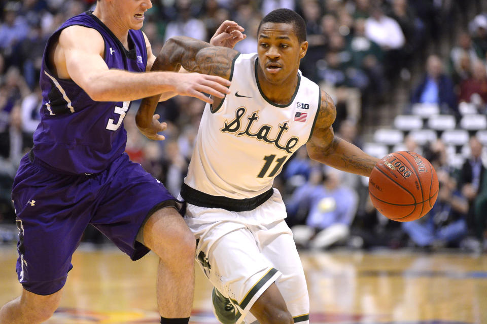 Keith Appling (11) battles with Northwestern Wildcats guard Dave Sobolewski (3) during the Big Ten Men's Basketball Tournament game between the Michigan State Spartans vs Northwestern Wildcats at Bankers Life Fieldhouse in Indianapolis, IN. (Photo by Robin Alam/Icon SMI/Corbis/Icon Sportswire via Getty Images)