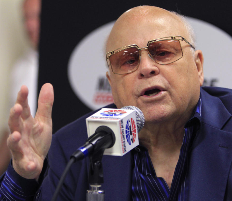 FILE -New Hampshire Motor Speedway Chairman of the Board Bruton Smith speaks during a news conference at the track, Friday July 15, 2011, in Loudon, N.H. Bruton Smith, a North Carolina native and entrepreneur who fell in love with auto racing and parlayed it into a career as an eccentric and successful promoter, died Wednesday, June 22, 2022 of natural causes. He was 95. His death was confirmed by Speedway Motorsports, the company he founded and owns and operates 11 race tracks across the United States. (AP Photo/Jim Cole, File)