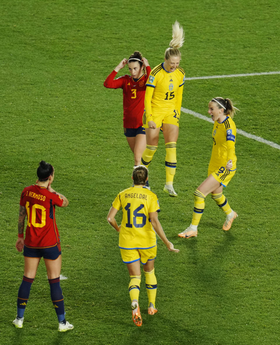 Sweden's Rebecka Blomqvist, second right, celebrates with teammates after scoring her side's first goal during the Women's World Cup semifinal soccer match between Sweden and Spain at Eden Park in Auckland, New Zealand, Tuesday, Aug. 15, 2023. (AP Photo/Abbie Parr)