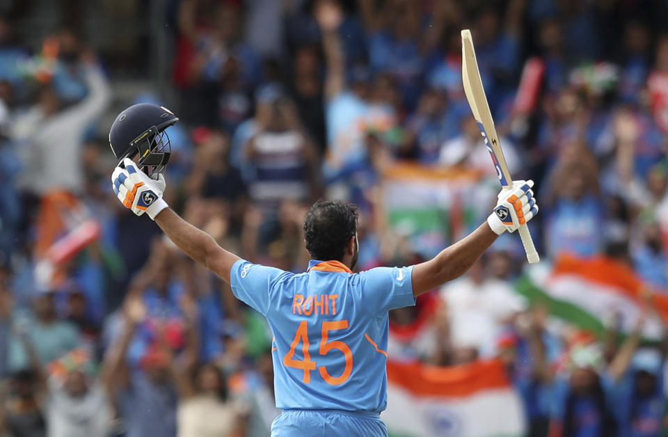 India's Rohit Sharma celebrates after scoring a century during the Cricket World Cup match between India and Sri Lanka at Headingley in Leeds, England, Saturday, July 6, 2019. (AP Photo/Jon Super)