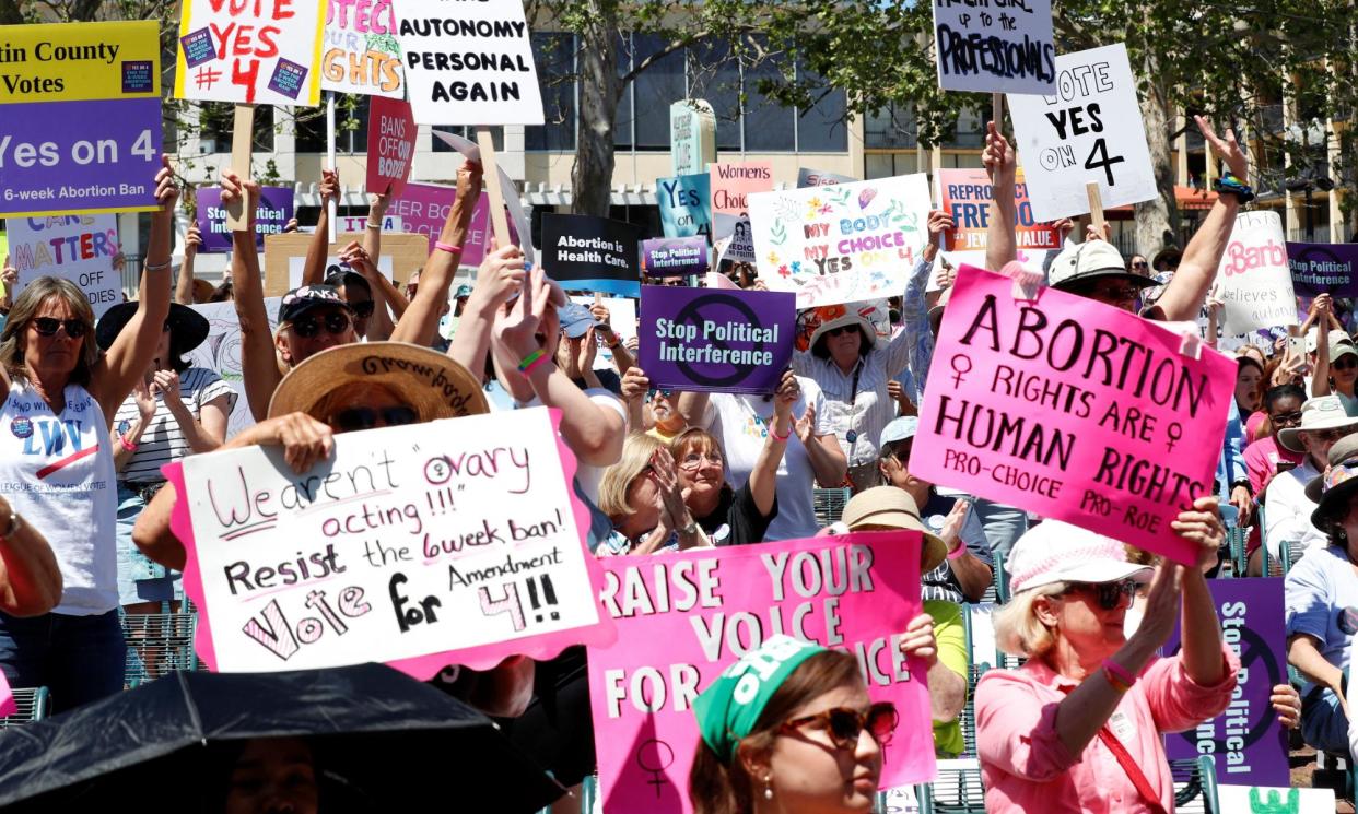 <span>Abortion rights advocates rally against the six-week abortion ban in Orlando, Florida, on 13 April 2024.</span><span>Photograph: Octavio Jones/Reuters</span>