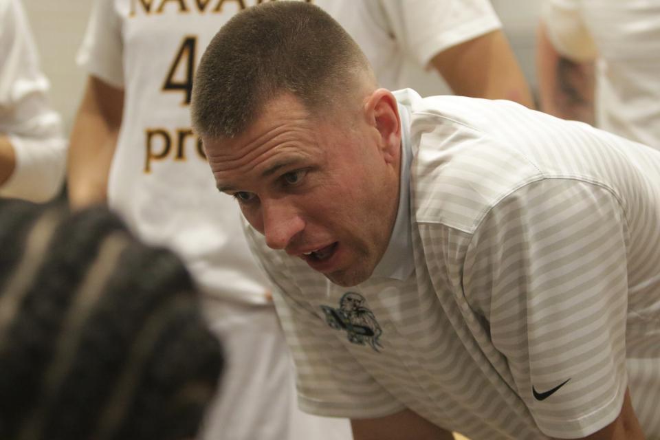 Navajo Prep head basketball coach Matt Melvin talks to his team during a timeout against Zuni on Wednesday, Feb. 19, 2020, at the Eagles Nest in Farmington.