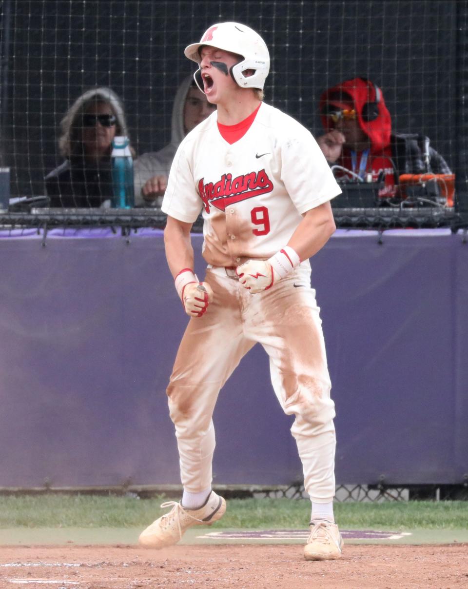 Roy C. Ketcham player Ryan Mealy lets out a yell after crossing home plate during their game against Elmira High School in the boys baseball Class AA Regional Final game at John Jay High School in Cross River, June 3, 2023. Ketcham beat Elmira, 12-1 in 5 innings.