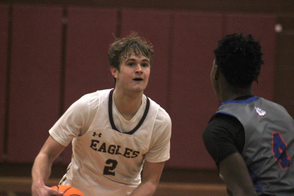 Episcopal guard Kent Jackson dribbles against Bolles during a January game.