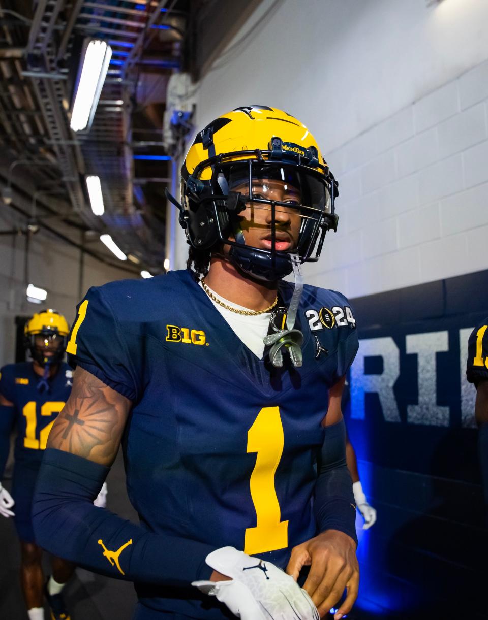 January 8, 2024;  Houston, Texas, USA;  Michigan Wolverines quarterback Amorion Walker (1) against the Washington Huskies during the 2024 College Football Playoff national championship game at NRG Stadium.  Mandatory Credit: Mark J. Rebilas-USA TODAY Sports