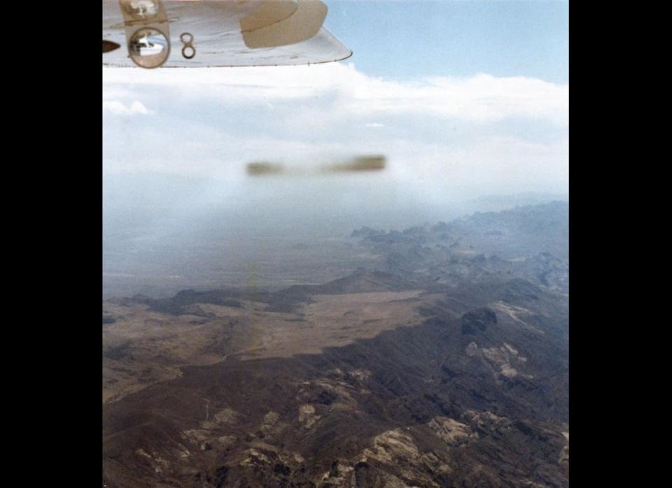 This cigar-shaped UFO was photographed by general aviation pilot David Hastings as he piloted a Cessna Skymaster plane over the Mojave Desert on Sept. 9, 1985. There has never been an indication of hoax in this case, which remains unexplained to this day.